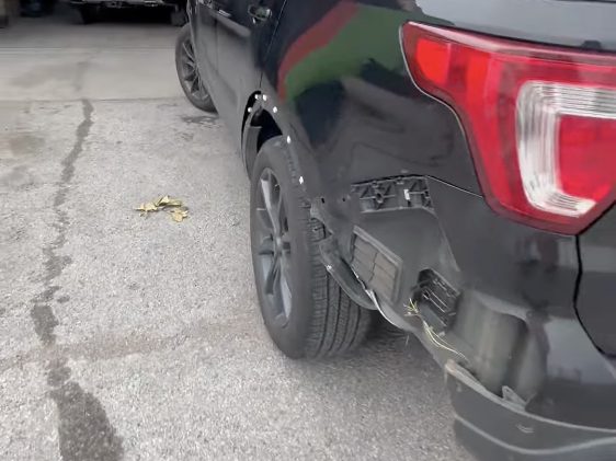 Before: Ford Explorer XLT, rear quarter panel and bumper, at Daviel's in Tulsa